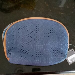 Blue eyelet makeup/accessories bag